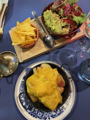 Guacamole + baked potatoes and vegan cheee   at Ziga in Verona