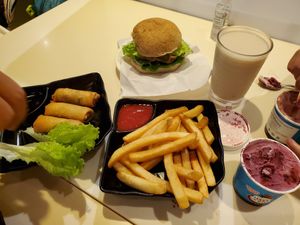 Burger, chips, spring rolls, soy milk and ice cream at Loving Hut - Amoy Plaza in Kowloon