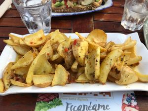Fried potatoes with "Chimichurri" sauce at Maiatza in San Sebastian
