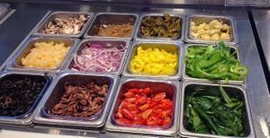 Lots of veggie toppings  at Blaze Pizza - Eisenhower Pkwy in Ann Arbor