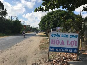 Signage from main highway at Hoa Loi in Tra Vinh
