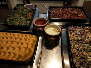 salad with green lentils, hummus with carrot, kidney beans sweet corns, capsicum and white cabbage salad at RizRaz - Kannikestraede in Copenhagen