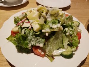 salad with "cheese" dressing at Nataraj - Harajuku Omotesando in Tokyo