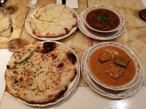 Punpkin curry (very little spicey), soya meat curry (spicey but eatable😉) , garlic nan and cheese nan (cheese nan is good but in my opinion not in combination with curry)  at Nataraj - Harajuku Omotesando in Tokyo
