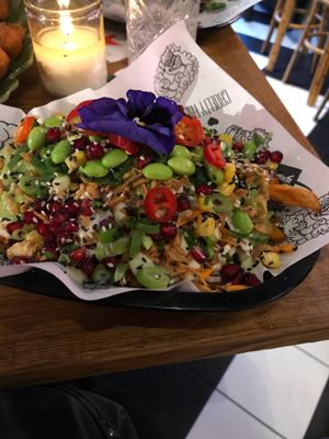Bottom of this dish has sweet potato fries at Vegan Junk Food Bar - Eastside in Amsterdam
