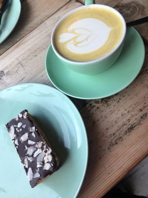 Coconut and dark choc slice and turmeric latte  at No35 Harrogate Coffee in Harrogate