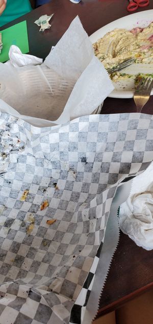 This is what's left of our veggie plate with falafel and fried  eggplant sandwich...Very delicious! The guy working was knowledgeable of what was vegan. He substituted the baba gha at King O Falafel in Kissimmee