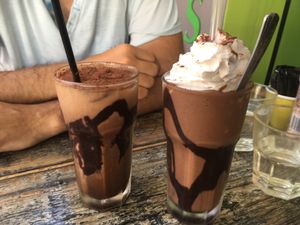 Ice coffee and chocolate smoothie with coconut milk whip  at Pure Wholefoods in Manly
