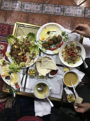 Fattoush, lentil soup, hummus and falafel  at La Puerta de Syria in Granada