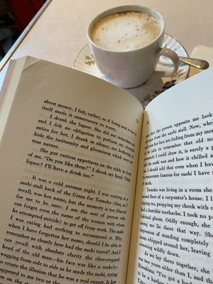 Hazelnut cappuccino and my book   at Sullaluna in Venice