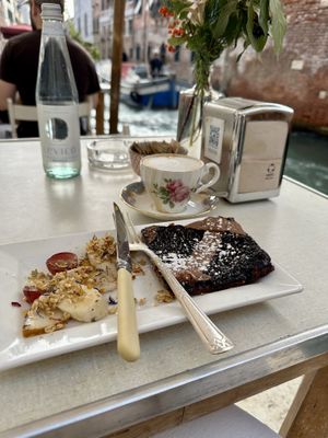 An oatmilk cappuccino & vegan forest berry tart w/ fresh fruit   at Sullaluna in Venice