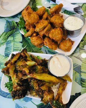 Tempura broccoli and fried pickles, sauces are amazing  at Birch Bark Eatery in Glen Falls