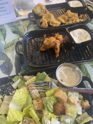 Fried pickles, cauliflower bites with bang bang sauce and Caesar salad with seitan  at Birch Bark Eatery in Glen Falls