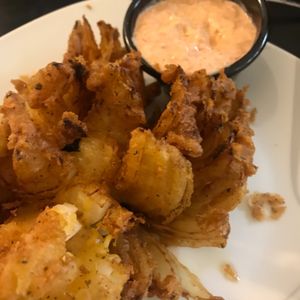 Flowered onion! Decadent batter! Can’t believe it’s vegan!  at Birch Bark Eatery in Glen Falls