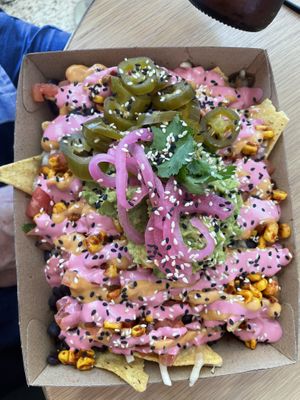 Nachos (single serve), with added jalapeños and guacamole   at Goodness Gracias in Palm Beach