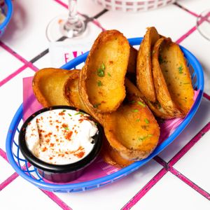 Potato skins w/ Sour cream (vgn opt) at Evies Disco Diner in Fitzroy