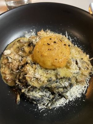 Charcoal spagetti with vegan egg yolk at Mark & Vinny's Spaghetti & Spritz in Surry Hills