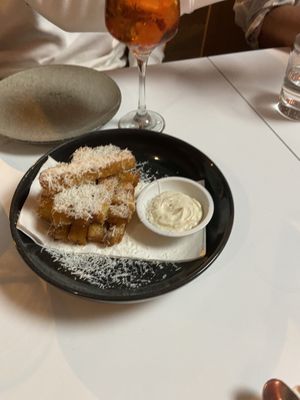 Amazing truffle polenta chips at Mark & Vinny's Spaghetti & Spritz in Surry Hills