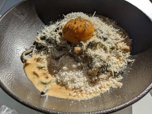 Charcoal bucatini with vegan egg at Mark & Vinny's Spaghetti & Spritz in Surry Hills