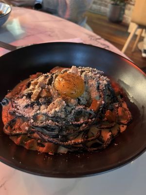 Charcoal Bucatini (with vegan egg)  at Mark & Vinny's Spaghetti & Spritz in Surry Hills