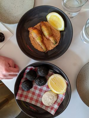 Zucchini flowers and arachini balls, both vegan, entrees. at Mark & Vinny's Spaghetti & Spritz in Surry Hills