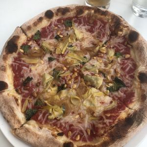 Vegan pizza with artichokes and pine nuts  at Flour & Barley in Las Vegas
