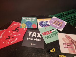 stickers at toilet at Blackbird in Bruges