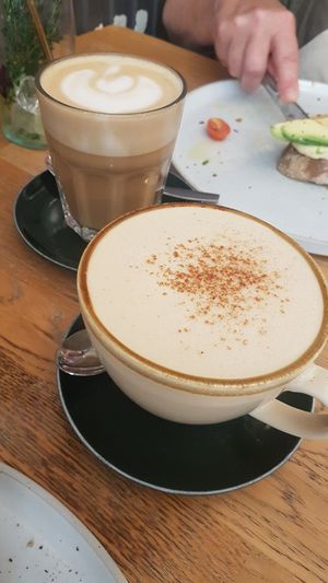 Chai latte and coffee latte at Blackbird in Bruges