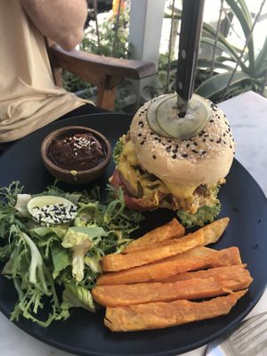 ‘The Right Burger’ seitan chicken strips with salad and mustard sauce, comes with sweet potato fries  at Secret Spot - Berawa in Tibubeneng