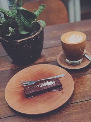 Cafe latte & vegan Bounty at Secret Spot - Berawa in Tibubeneng