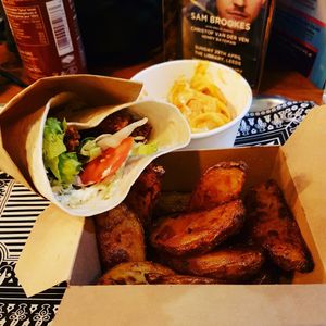 Seitan fish wrap with slaw and wedges at Knaves Kitchen in Leeds