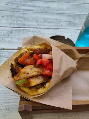 I think it's the red gyro. I would have loved to taste another one instead. at Cookoomela Grill in Athens