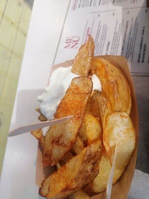Potatoes with tzatziki at Cookoomela Grill in Athens