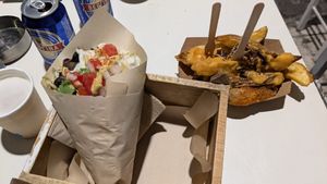 Rainbow. With cheesy bacon potatoes at Cookoomela Grill in Athens