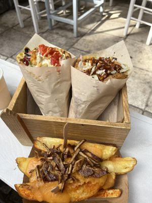 Pitas and home made fries with cheese and bacon   at Cookoomela Grill in Athens