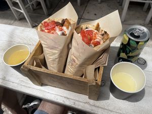 White & Classic souvlaki, organic vegan wine from Lemnos Island (left), lemonade (right)  at Cookoomela Grill in Athens