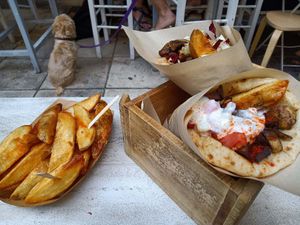 Souvlaki & extra potatoes. at Cookoomela Grill in Athens