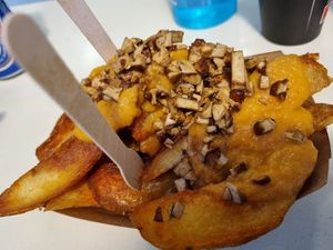 Bacon and cheese skin potato fries at Cookoomela Grill in Athens