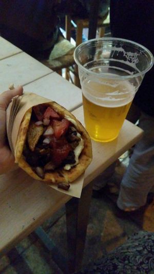 Red amanita with their beer at Cookoomela Grill in Athens