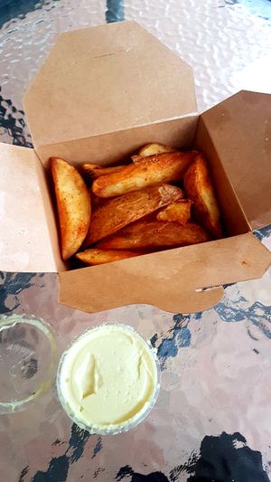 Potatoes with vegan mayo at Cookoomela Grill in Athens