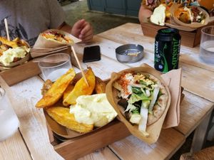The "green" gyro with fries at Cookoomela Grill in Athens