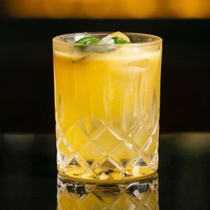 KAFFIR LIME CRUSH - Vodka, local passionfruit, kaffir lime leaves, apple at Merah Putih in Seminyak