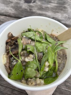 Delicious mushroom barley porridge with Danish cheese   at GRØD -Torvehallerne in Copenhagen