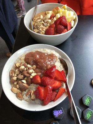 Oatmeal with rhubarb compote, strawberries and almonds in front (vegan); with caramel, granola and apples in the back (I’m sure the caramel contains dairy). Yum! at GRØD -Torvehallerne in Copenhagen