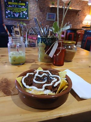Yummy vegan nachos and vegan iced matcha latte at Charlie Friday's in Lynton