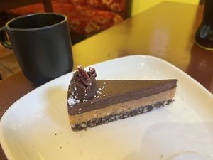 Snickers cake with complimentary coffeee  at Chutney in Stockholm