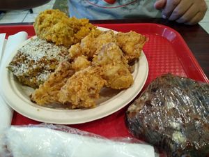 Stuffed bell pepper, fried cauliflower, cornbread dressing and brownie at Sweet Soulfood in New Orleans