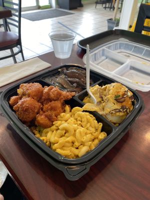 Four choices plate: mushrooms / Mac n cheese / loaded potatoes (OMG) / sticky cauliflower   at Sweet Soulfood in New Orleans