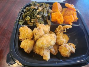 Collard greens, sweet potatoes, and fried cauliflower at Sweet Soulfood in New Orleans