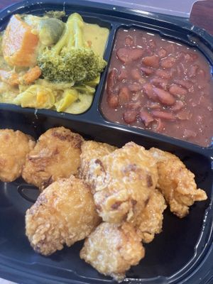 Curry with red beans and rice and orange cauliflower  at Sweet Soulfood in New Orleans